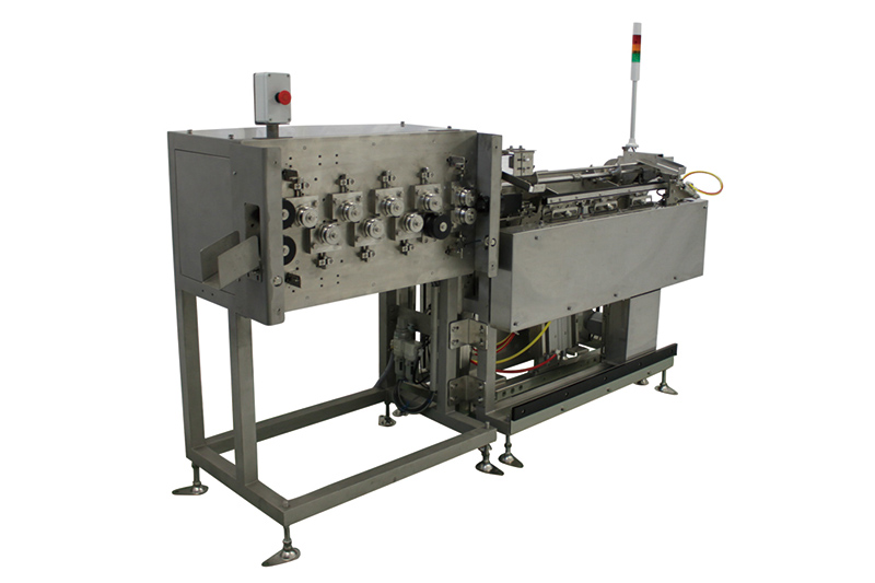 STICK STRAIGHTENING MACHINE